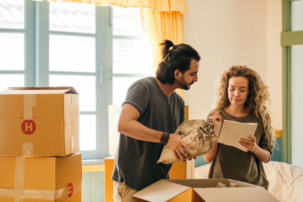 tenants packing things in boxes