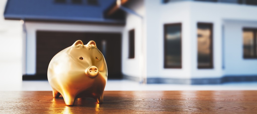 Piggybank and new house, saving for home, mortgage. Golden piggy bank. 3D illustration