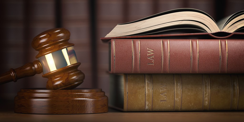 Justice, law and legal concept. Judge gavel and law books. 3d illustration