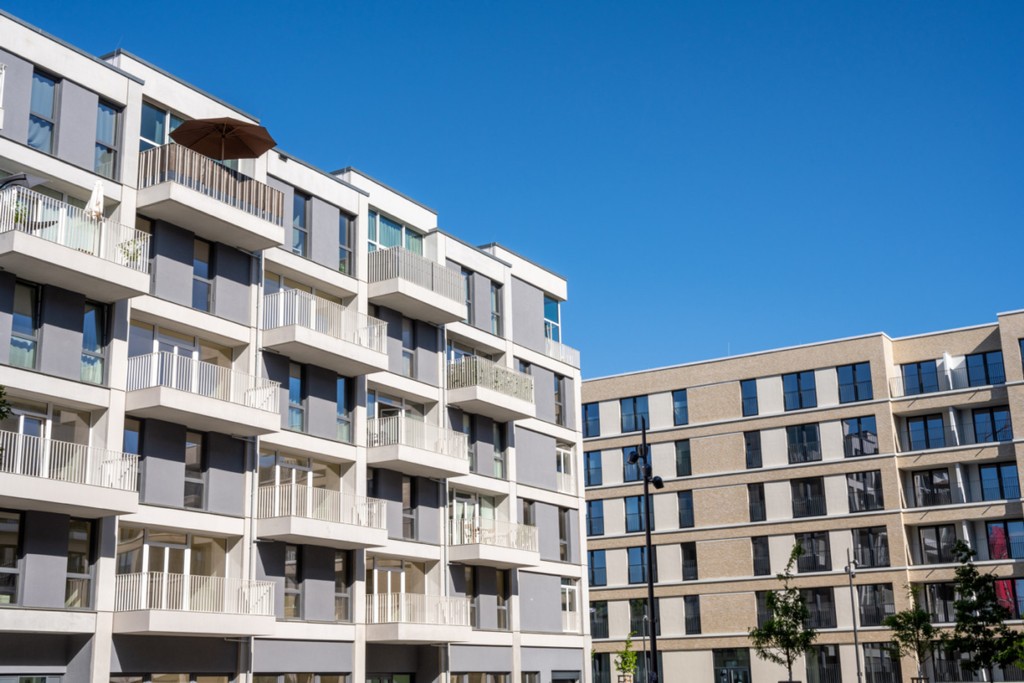 modern housing develpment against a blue sky for rent