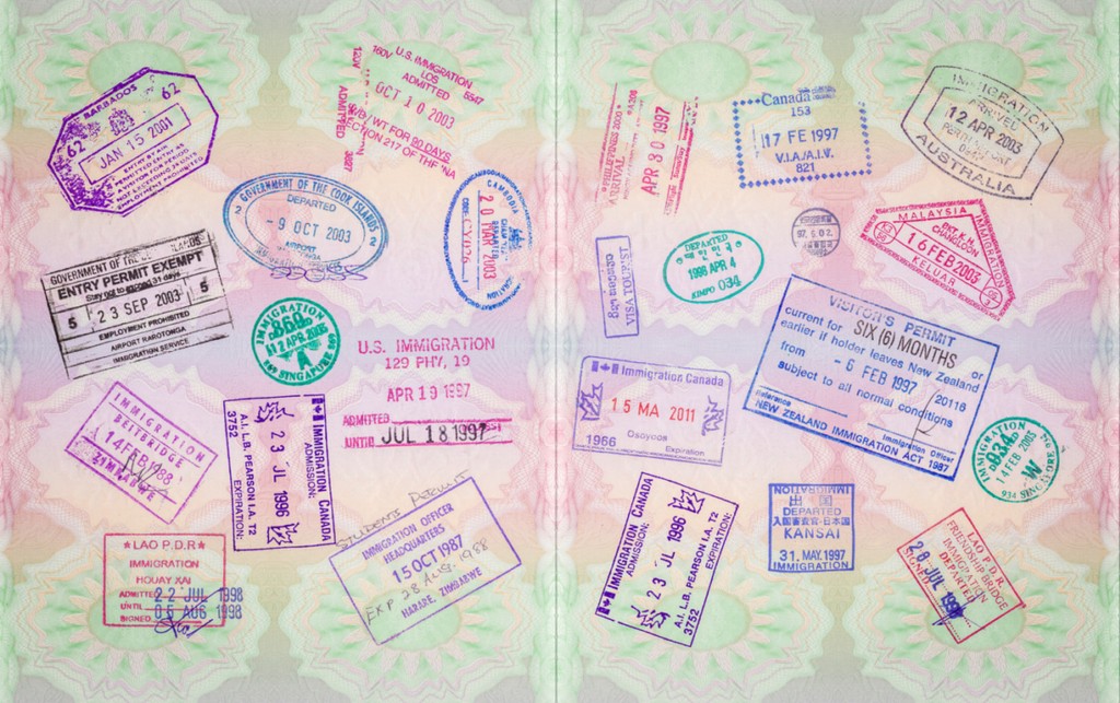 Retro Vintage Stamps In A European Passport From Multiple Locations - you need to show documents such as a passport when proving Right to Rent