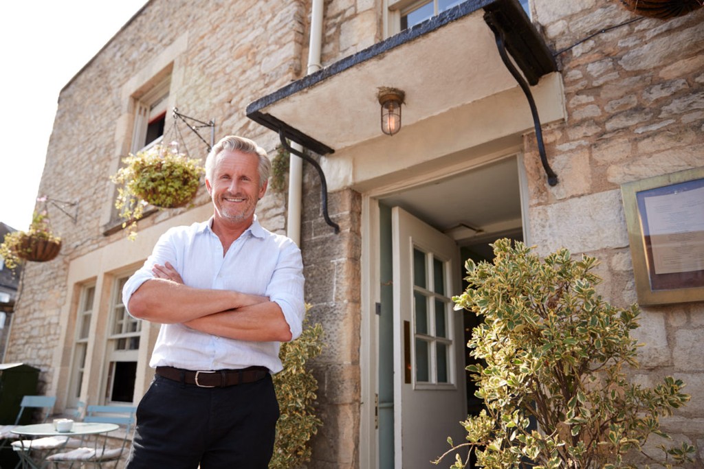 landlord outside his home 