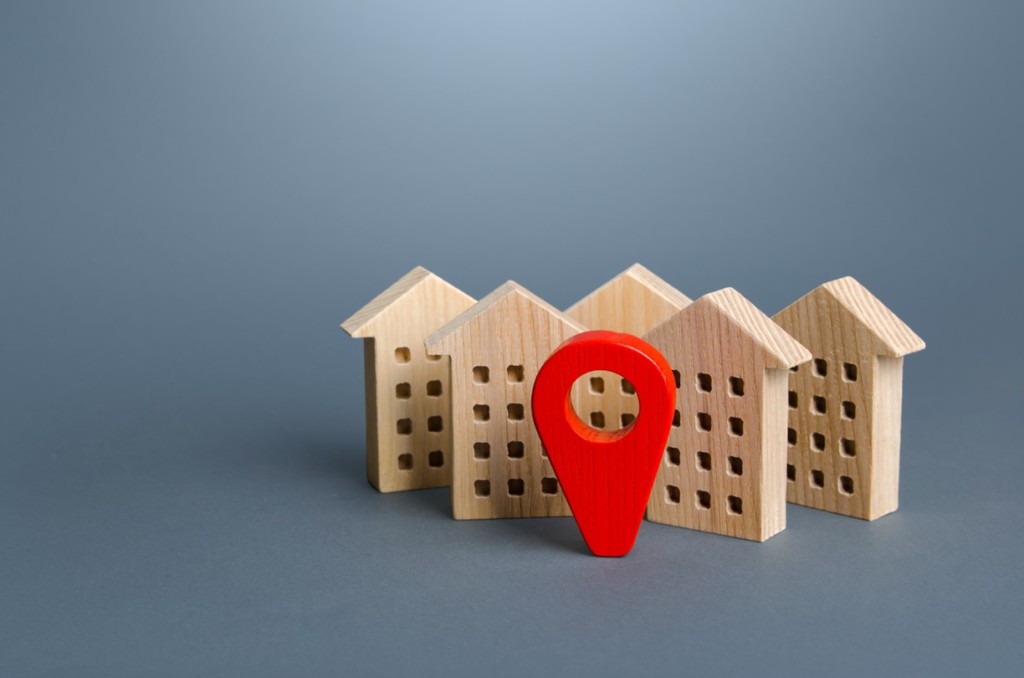 A location pin shows the location of buy to let houses