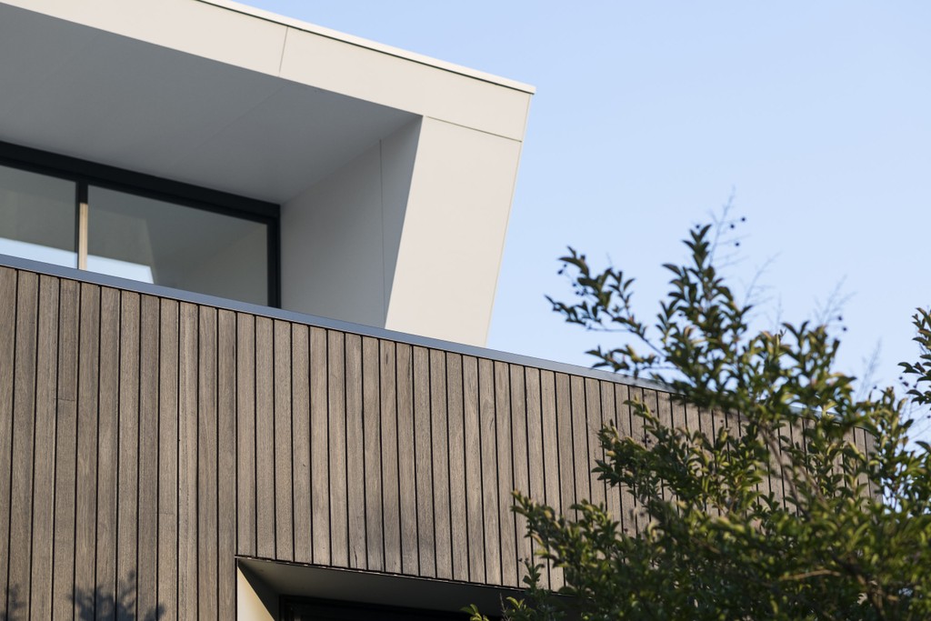 timber cladding against blue sky 