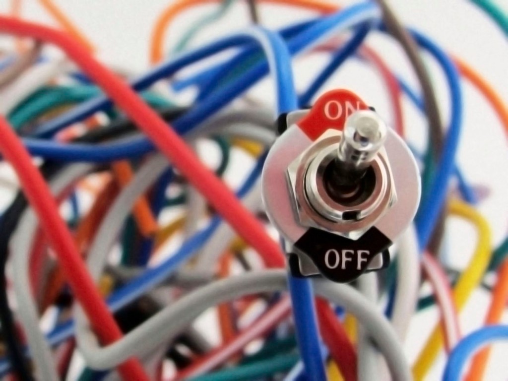 multicoloured electric wires and on off baton